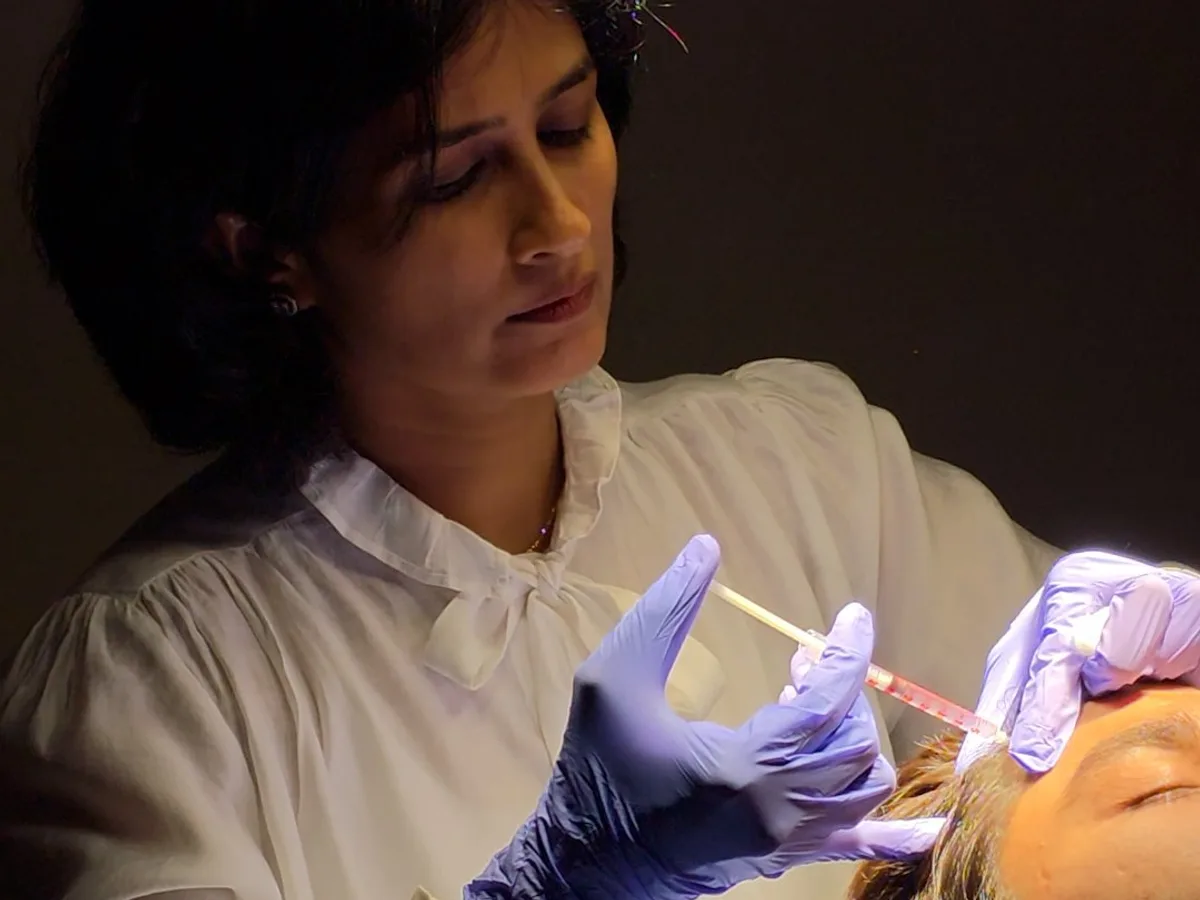 Dr. Daksha Patel performing an anti-wrinkle injection at Skin Essence